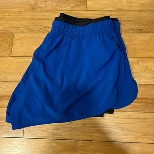 Blue Nike athletic shorts